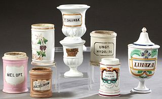 Group of Eight Ceramic Apothecary Drug Jars, 19th and early 20th c., two with glass labels; "Vaselinum," and "Columbae," together with "Cort. Agued," 