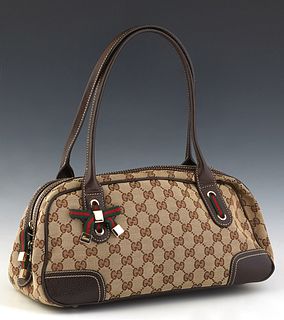 Gucci Princy Boston Shoulder Bag, in beige monogram canvas with dark brown leather accents and golden hardware, opening to a dark brown canvas lined i