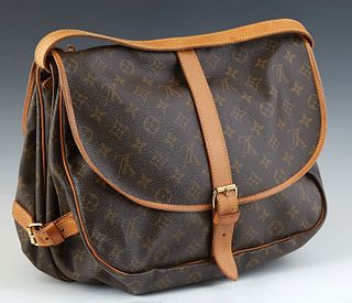 Louis Vuitton Samur 30 Shoulder Bag, in brown monogram coated canvas with vachetta leather accents and golden brass hardware, opening to a brown canva