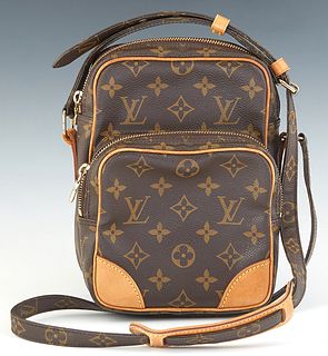 Louis Vuitton Amazone Shoulder Bag, in brown monogram coated canvas with vachetta leather accents and golden brass hardware, opening to a brown canvas