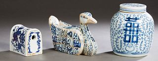 Three Oriental Blue and White Porcelain Items, consisting of a pillow, a shard duck figure, and a covered ginger jar. (3 Pcs.)