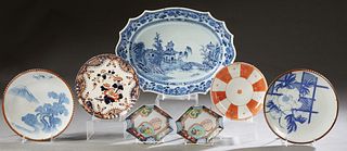 Seven Pieces of Blue and White China, 19th and 20th c., consisting of a large Chinese platter; a Doulton plate; a pair of shaped square dishes; an ora