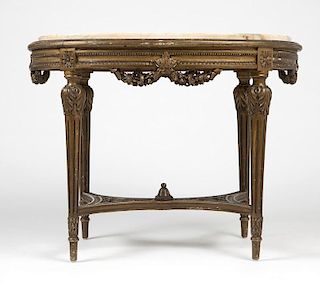 A Louis XVI-style carved and giltwood table