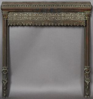 Unusual Bronze Fireplace Summer Front Frame, 19th c., New Orleans, the relief scrolled top over a relief leaf and floral panel, above a jagged dentill