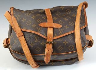 Louis Vuitton Saumer 25 Shoulder Bag, in a brown monogram coated canvas, with vachetta leather and golden brass hardware, with a brown canvas lined in