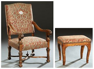 French Louis XIV Style Carved Walnut Armchair, late 19th c., the canted arched upholstered back to acanthus carved scrolled arms, over a cushioned sea