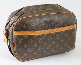 Louis Vuitton Brown PM Monogram Coated Canvas, the vachetta leather trim and accents with brown canvas adjustable shoulder strap, the front with an op