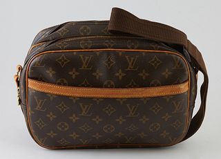Louis Vuitton Brown Monogram Coated Canvas 35 Speedy Handbag, with golden brass hardware, opening to a brown canvas lined interior with a small pocket