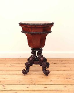 A Victorian flame mahogany teapoy by Gillows of Lancaster,