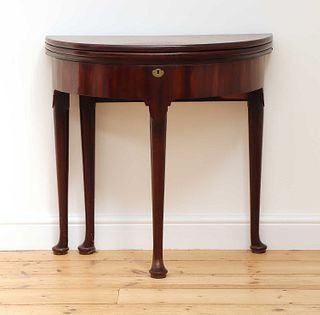 A George II mahogany triple fold-over demilune side table,