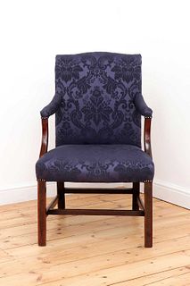 A George III mahogany Gainsborough armchair,