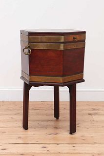 A George III mahogany brass-bound wine cooler and stand,