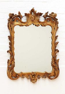 A George III carved giltwood mirror,