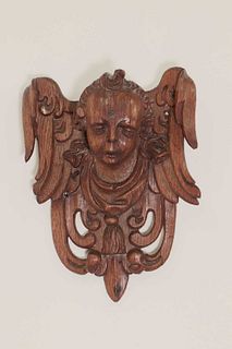 A carved oak corbel,