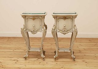 A pair of French Louis XV-style painted bedside tables,