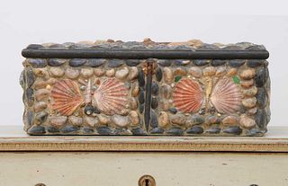 A shell-covered box,