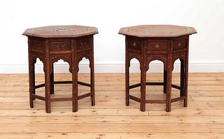 A near pair of Indian octagonal teak occasional tables
