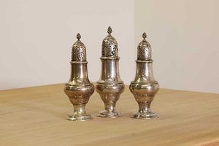 A set of three George III silver condiment casters,