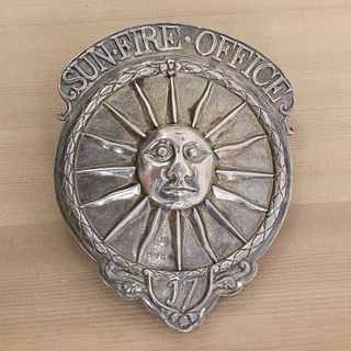 A George III silver Sun Fire Office fireman's arm badge,
