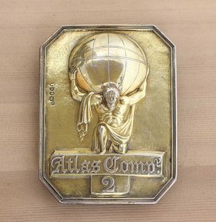 A George III silver gilt Atlas Company fireman's arm badge,