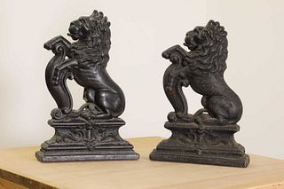 A matched pair of cast iron doorstops,