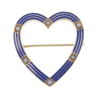 A mid 20th century enamel and split pearl heart brooch. The openwork heart with blue enamel lines an