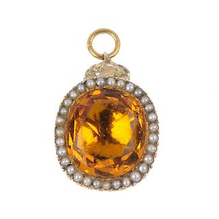 A mid 19th century citrine and split pearl pendant. The cushion-shape foil back citrine, within a sp