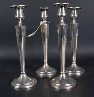 Four E. Caldwell Sterling Silver Candlesticks