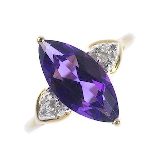 A 9ct gold amethyst and diamond dress ring. The marquise-shape amethyst, to the single-cut diamond t