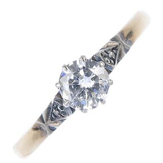 A diamond single-stone ring. The brilliant-cut diamond, with diamond accent shoulders, to the plain