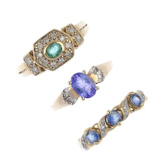 A selection of three diamond and gem-set rings. To include an emerald and diamond cluster ring, a ta