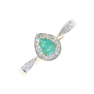 A 9ct gold emerald and diamond cluster ring. The pear-shape emerald, within a pave-set single-cut di
