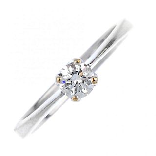 A 9ct gold diamond single-stone ring. The brilliant-cut diamond, to the plain band. Estimated diamon