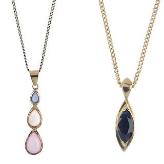 Two gem-set pendants. To include a graduated pear-shape stained mother-of-pearl pendant, together wi