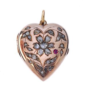An early 20th century diamond heart locket. The rose-cut diamond floral cluster, with similarly-cut