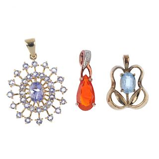 A selection of six gem-set pendants. To include a 9ct gold tanzanite cluster pendant, a 9ct gold pin