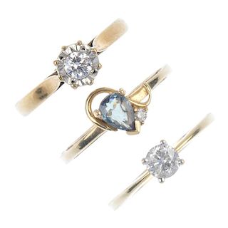 A selection of three 9ct gold diamond and gem-set rings. To include a green chrysoberyl ring with di