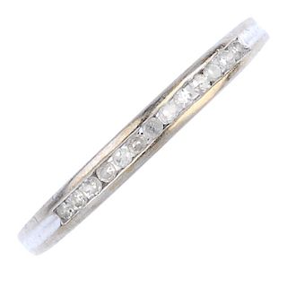 A 9ct gold diamond ring. The single-cut diamond line, inset to the tapered band. Total diamond weigh