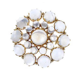 A 9ct gold moonstone brooch. Designed as a circular-shape moonstone cabochon cluster. Hallmarks for