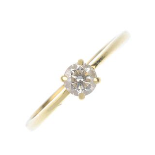 An 18ct gold diamond single-stone ring. The brilliant-cut diamond, to the tapered band. Diamond weig
