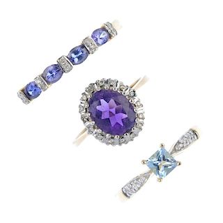 A selection of three 9ct gold diamond and gem-set rings. To include a tanzanite and diamond band rin