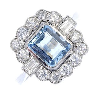 An aquamarine and diamond cluster ring. The rectangular-shape aquamarine collet, within a brilliant-