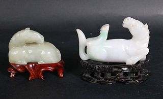 Two Carved White Jade Horses