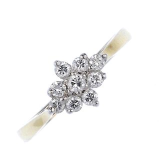 An 18ct gold diamond cluster ring. The brilliant-cut diamond kite-shape cluster, to the tapered shou