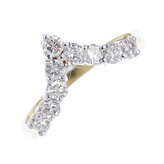 An 18ct gold diamond chevron ring. The brilliant-cut diamond chevron, to the plain band. Estimated t