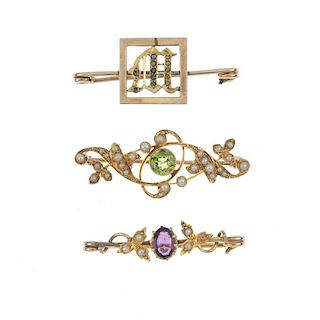 A selection of three early 20th century gold gem-set brooches. To include a peridot and split pearl