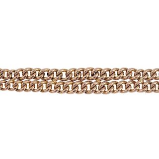 An early 20th century 9ct gold bracelet. The graduated curb-link double chain, to the padlock clasp.