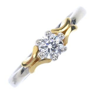 An 18ct gold diamond single-stone ring. Of bi-colour design, the brilliant-cut diamond, with curved