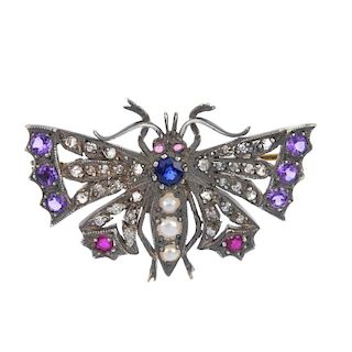 A diamond and gem-set butterfly brooch. The circular-shape sapphire and split pearl body, with simil