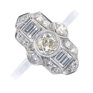 A diamond dress ring. The old-cut diamond collet, within a baguette and single-cut diamond geometric